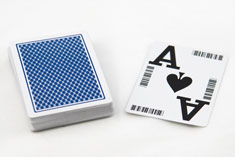 Playing cards for online broadcasting of multi-deck casino table games. Outer edge barcodes enable movement of cards sideways to laser scanners, facilitaing dealing proceedures of Baccarat and other Asian games.