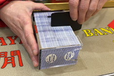 Card cut dealing box for Baccarat lets casino players cut 8 decks of playing cards cards with extra security & dealer comfort. Purpose designed form factor & cutout safeguard cut card dealing procedures.