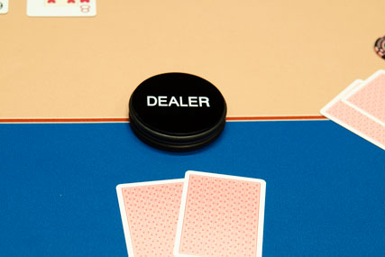 Selection of poker Dealer buttons, accessory for poker rooms