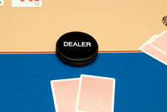 Selection of poker Dealer buttons, accessory for poker rooms