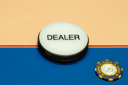 Selection of poker Dealer buttons, accessory for poker rooms