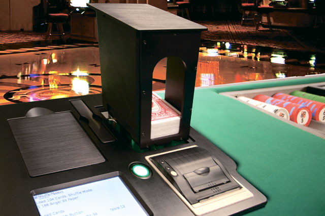 Shuffle machine for Baccarat (Punto Banco) and other multi-deck card games.