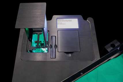 Shuffle machine for Baccarat (Punto Banco) and other multi-deck card games.